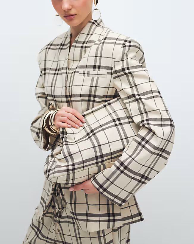 oversized clutch purse in cream plaid